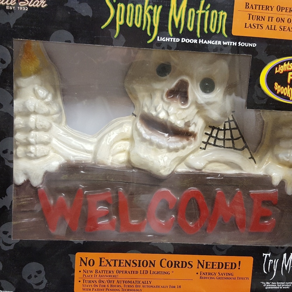 Spooky motion skeleton door hanger with lights and